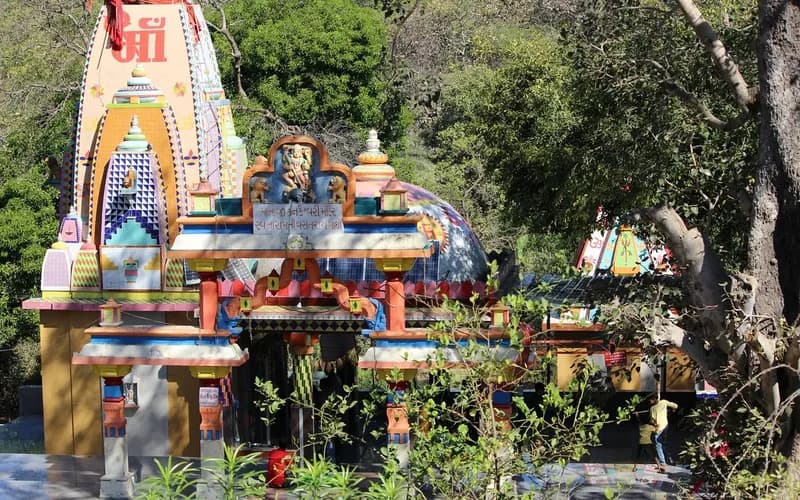 The brightly painted Kankai Mata shrine deep inside the Gir forest