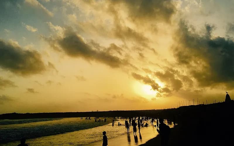 Evening crowds on Somnath beach at sunset